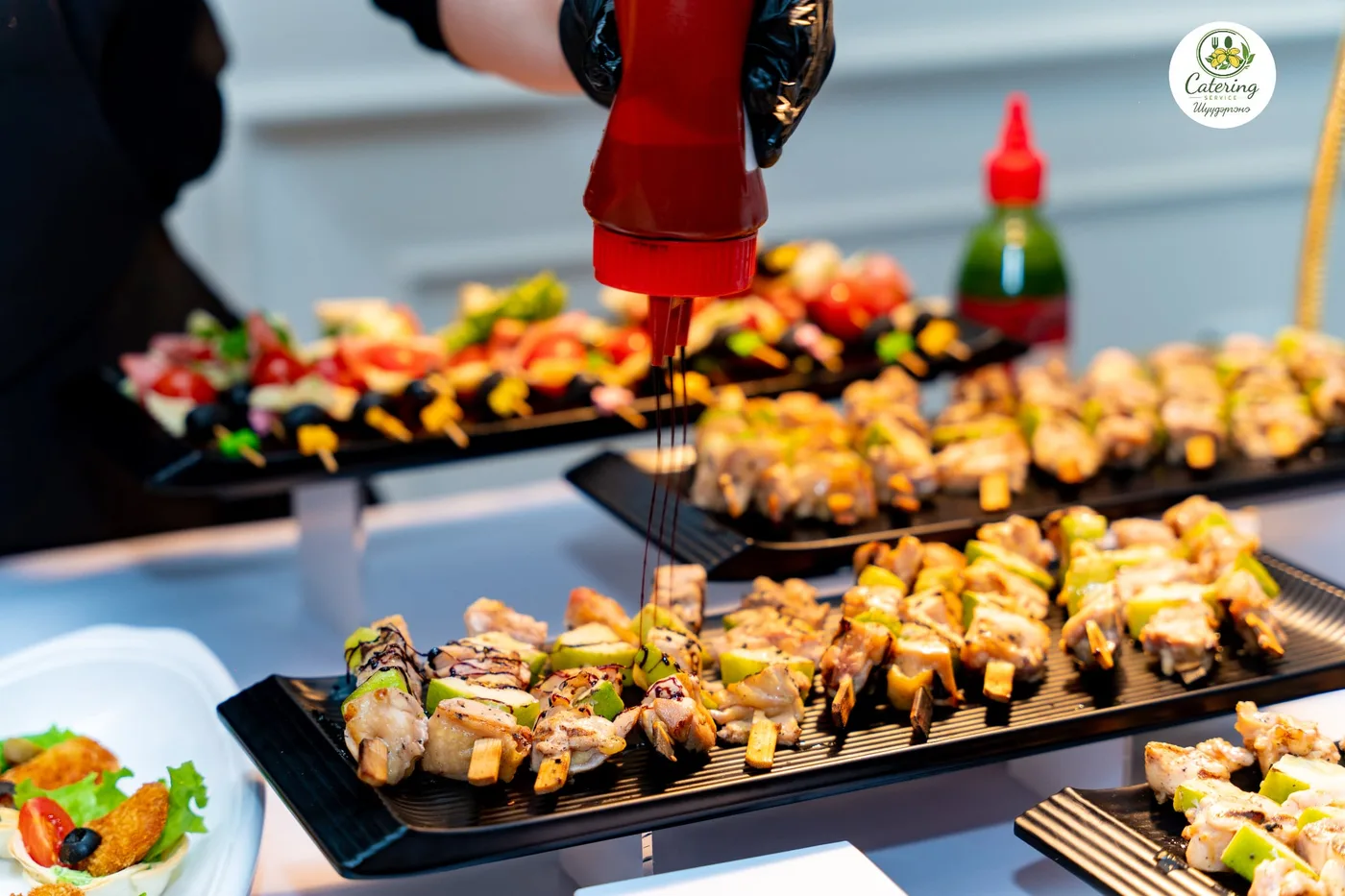 Chef preparing skewer dishes